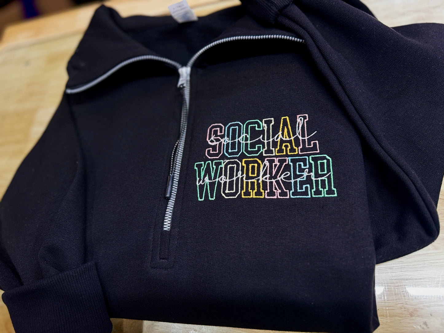 Embroidered social worker 1/4 zip