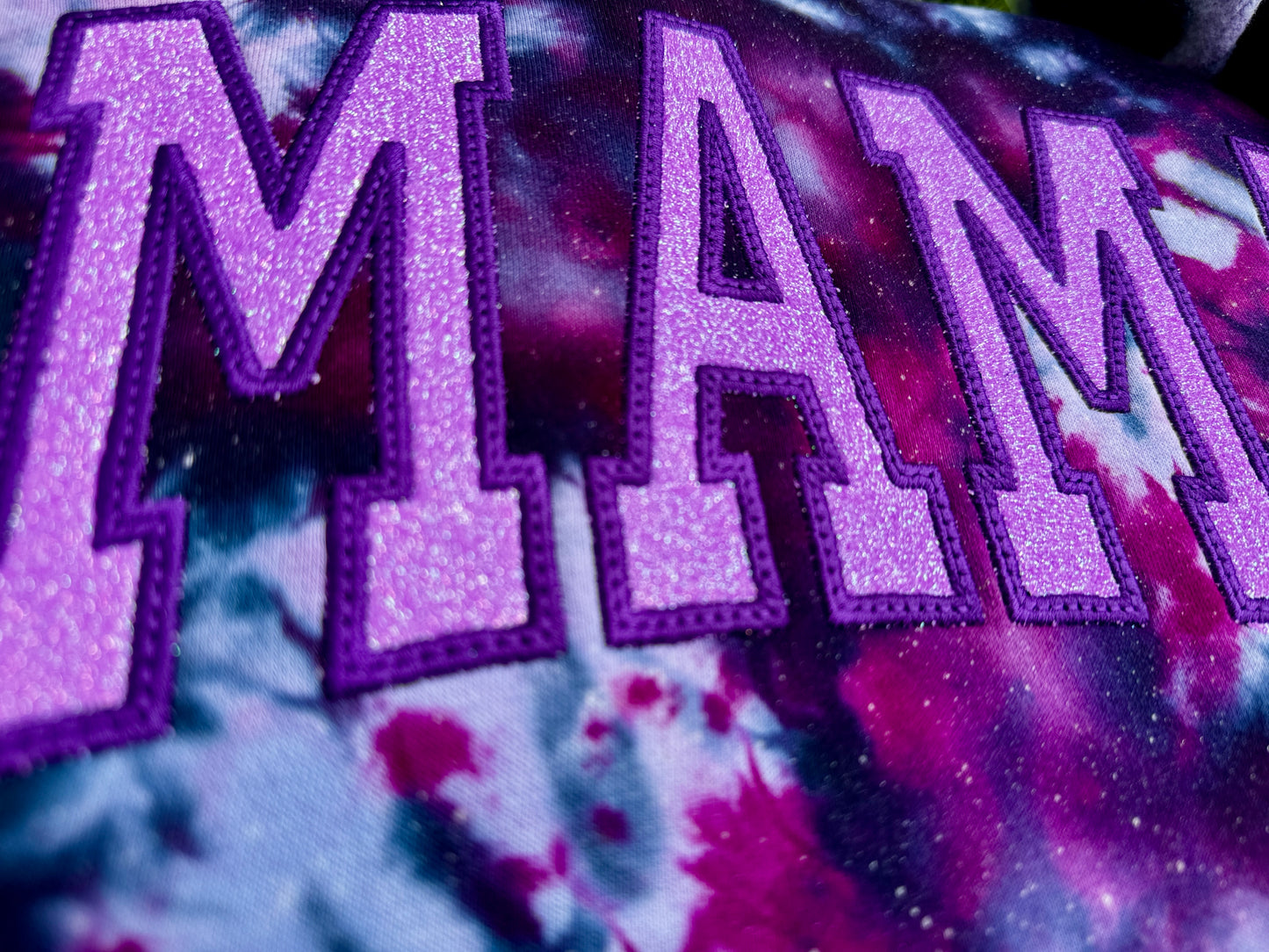 Embroidered tie dye glitter mama crewneck