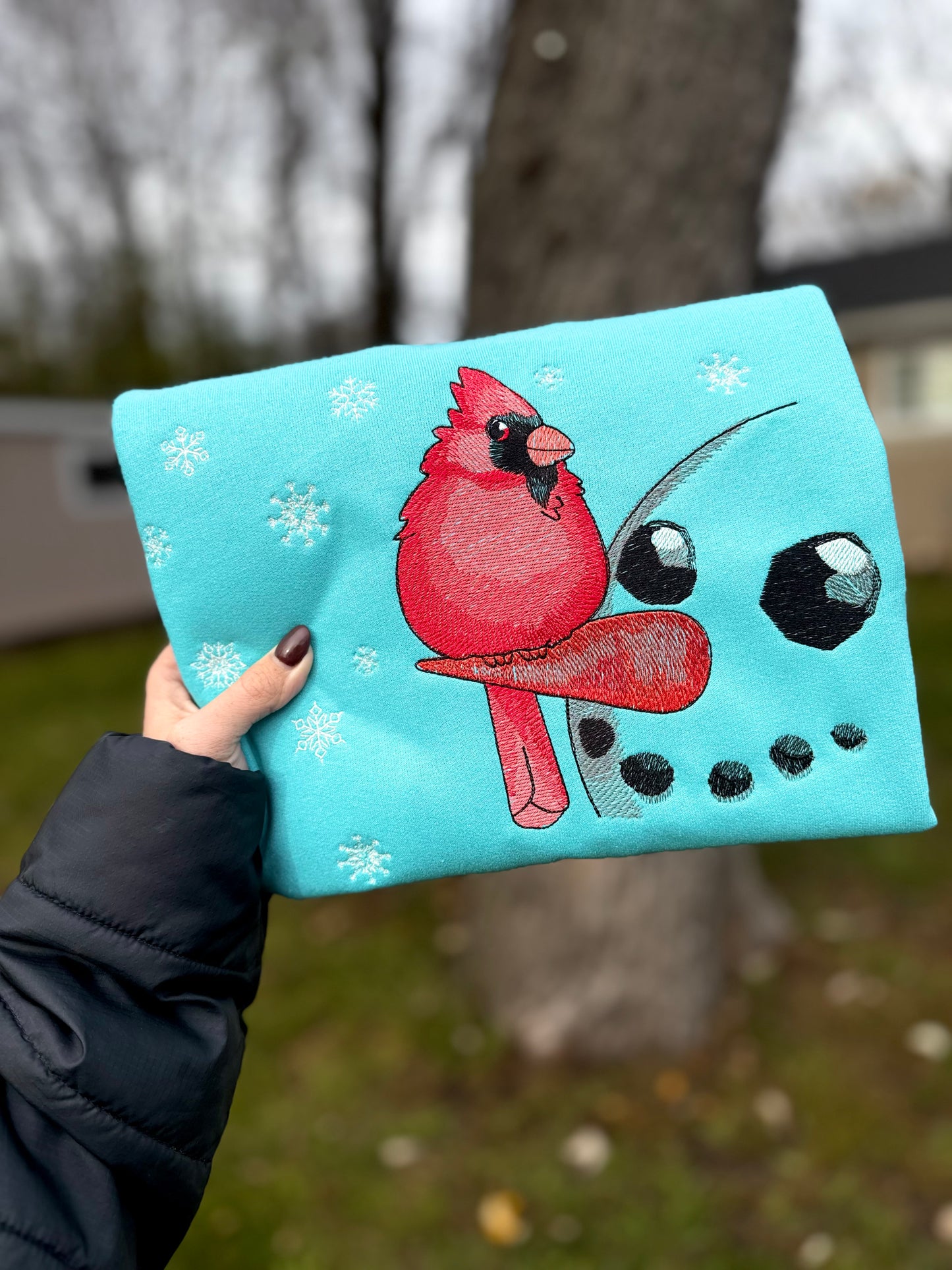 Embroidered cardinal crewneck