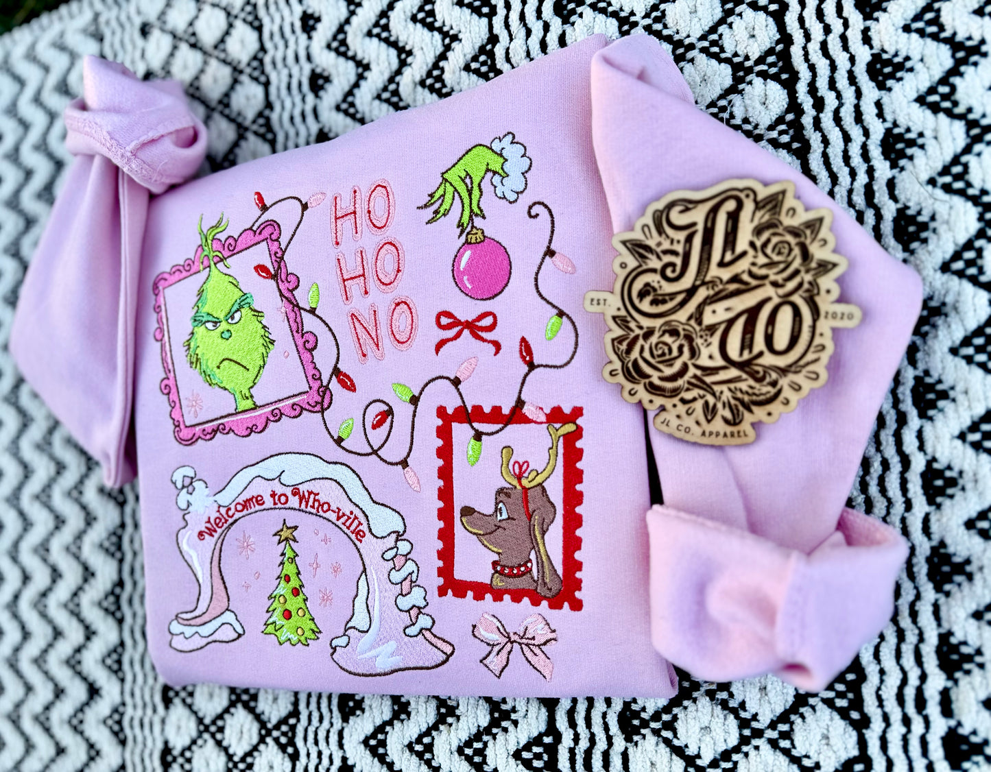 Embroidered green guy crewneck