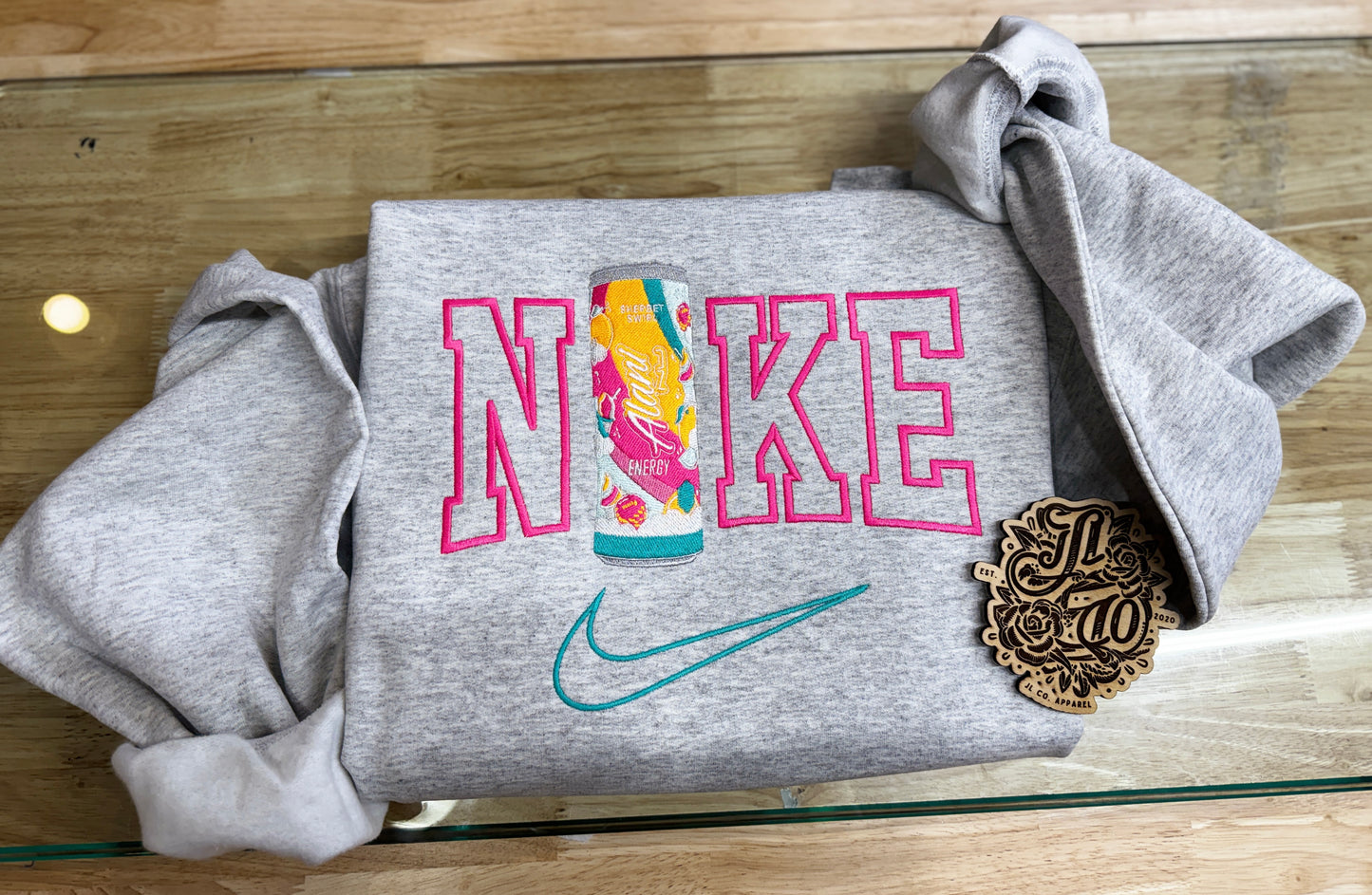 Embroidered swoosh energy crewneck