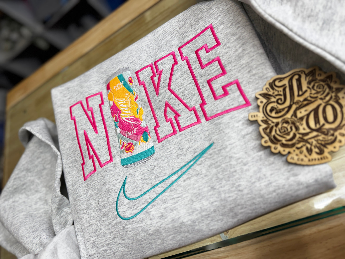 Embroidered swoosh energy crewneck