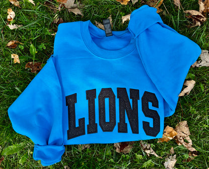 Embroidered lions crewneck