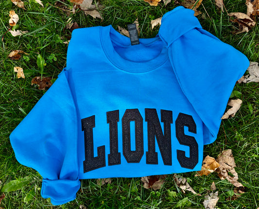 Embroidered lions crewneck