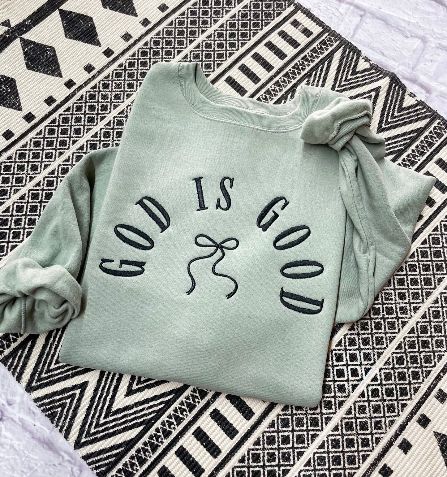 Embroidered god is good crewneck