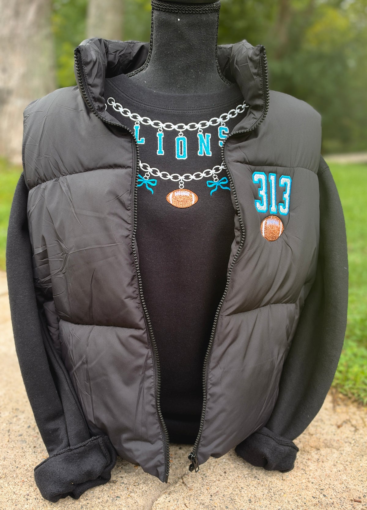 Embroidered charm football crewneck