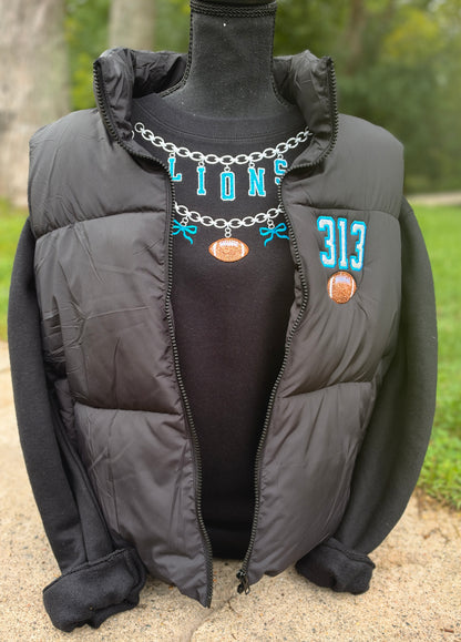 Embroidered charm football crewneck